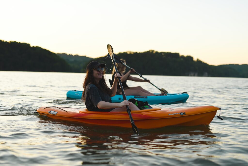Guests kayaking during a relaxing coastal retreat at Rams Head Inn on Shelter Island, NY