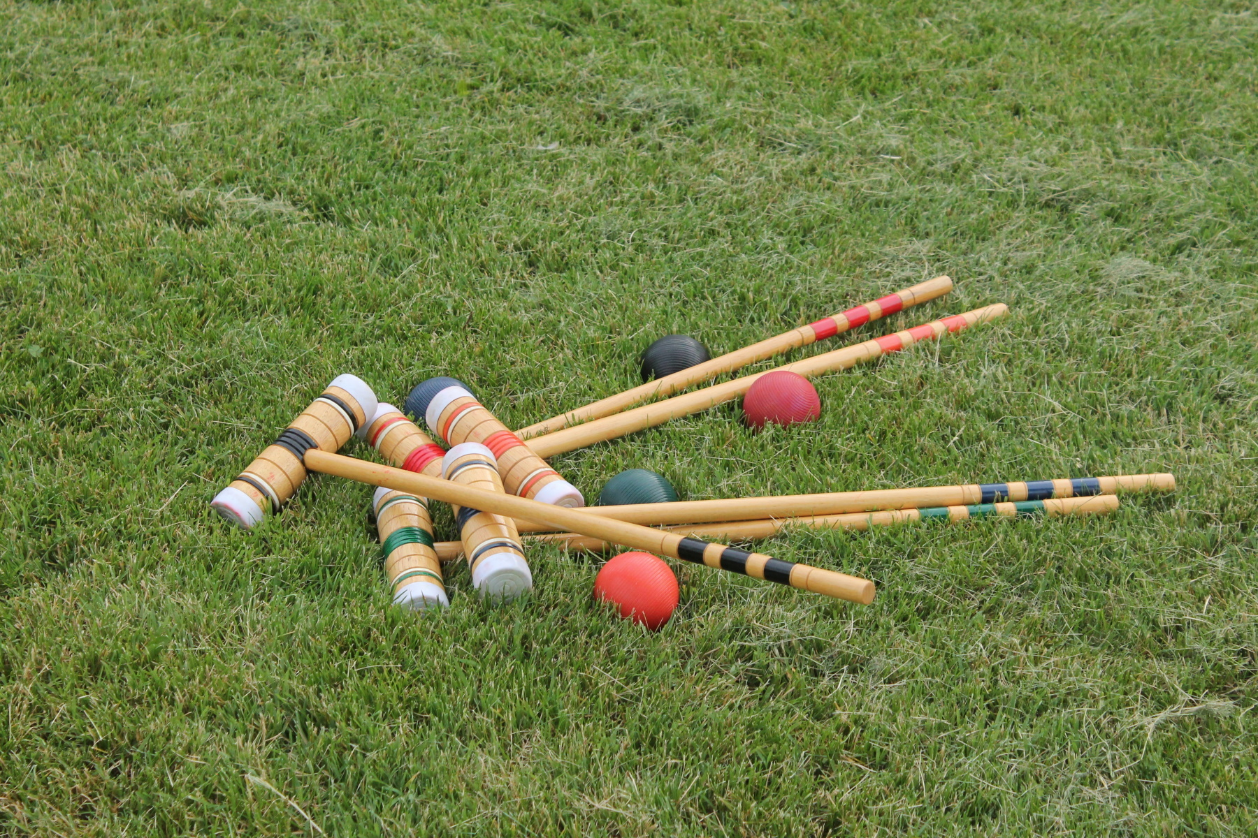A croquet set on lush grass highlights the fun games at the Rams Head Inn, Shelter Island.